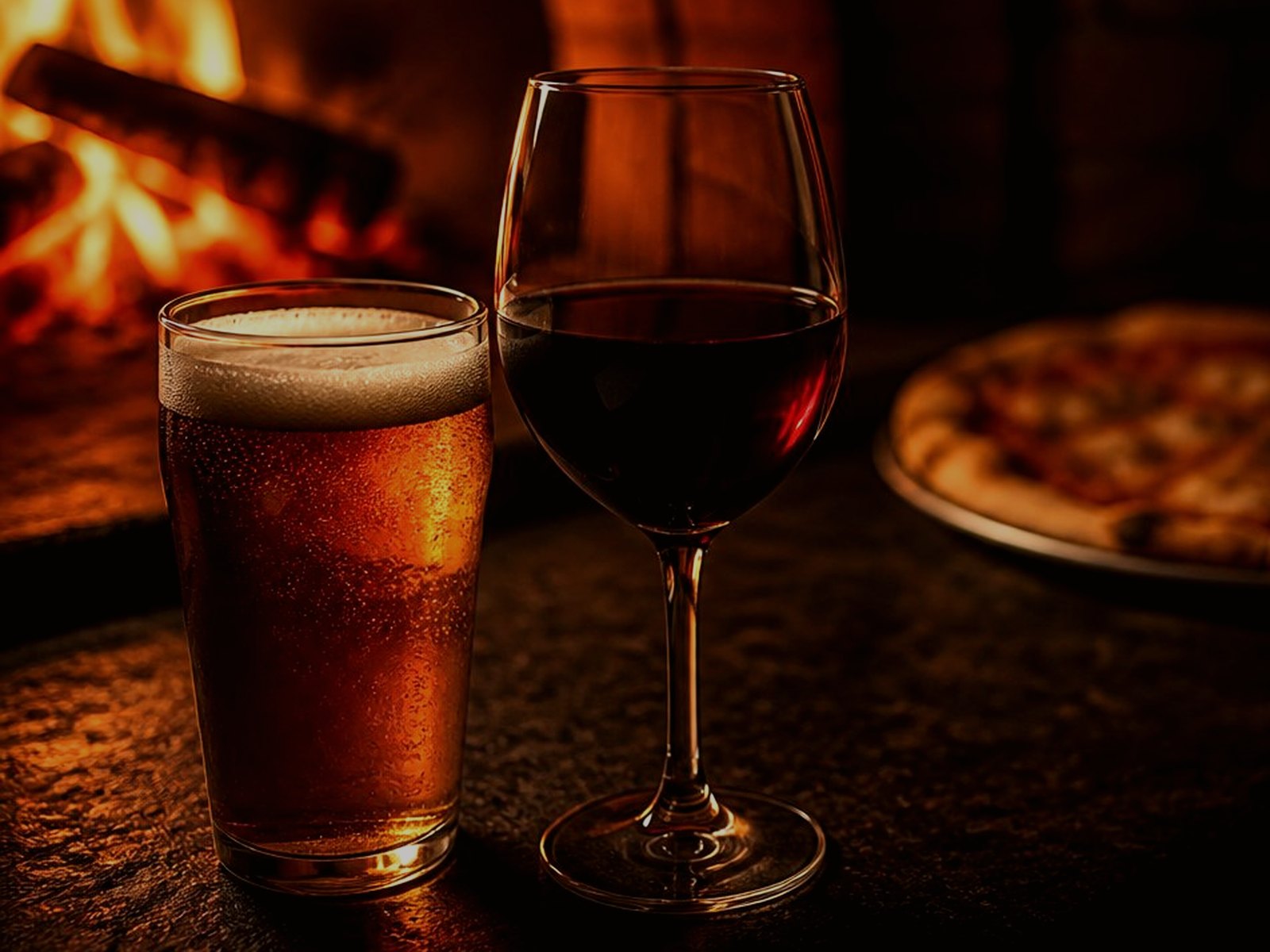 A cold beer glass on the bar.